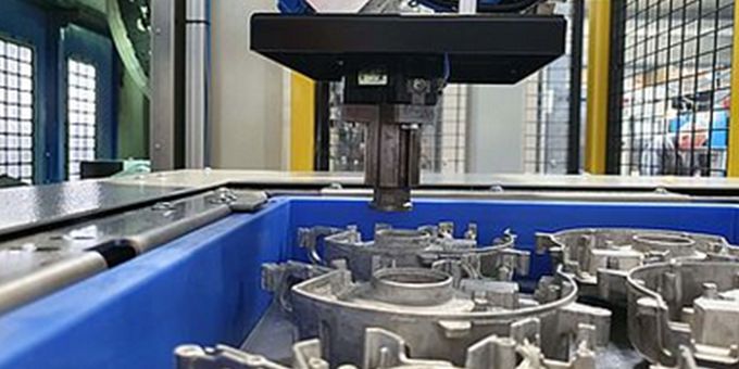 Robots Automate Machine Tools	